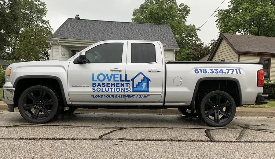 Lovell Basement Solutions, LLC company truck with logo and information - Edwardsville, IL