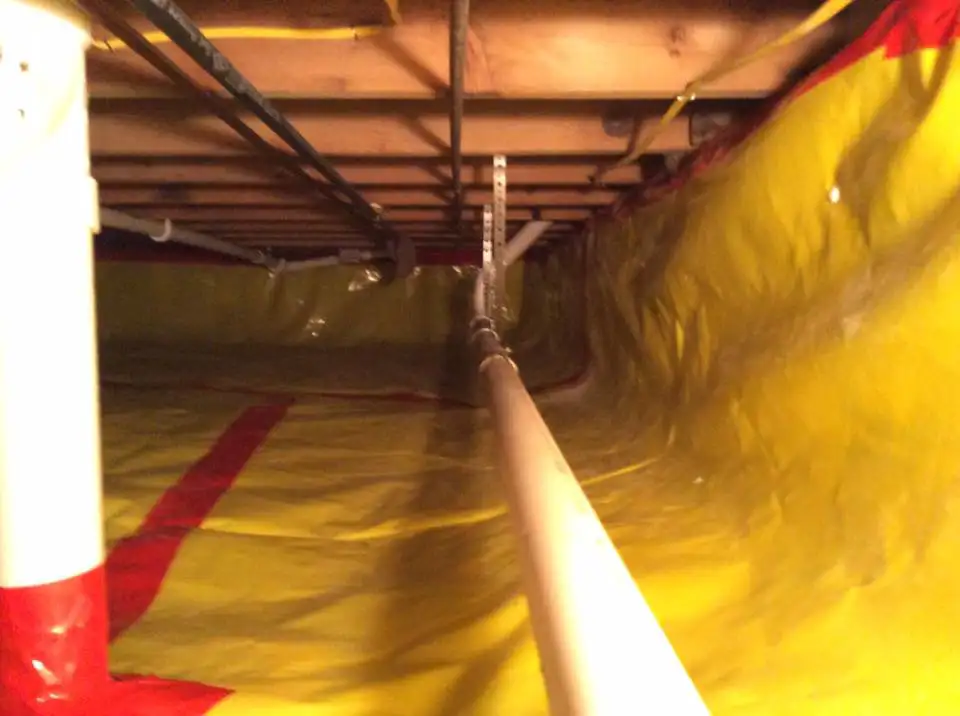 Lovell Basement Solutions, LLC water proofing crawlspace with pipes and tarps - Edwardsville, IL